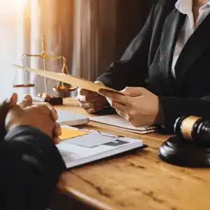 Lawyers in consultation meeting consider legal fees, including how much does a court reporter cost